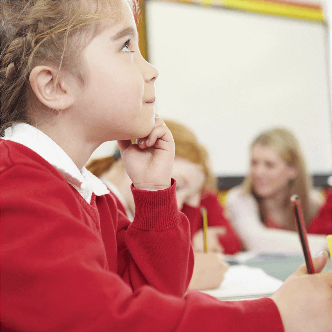 Child thinking with their hand on their chin
