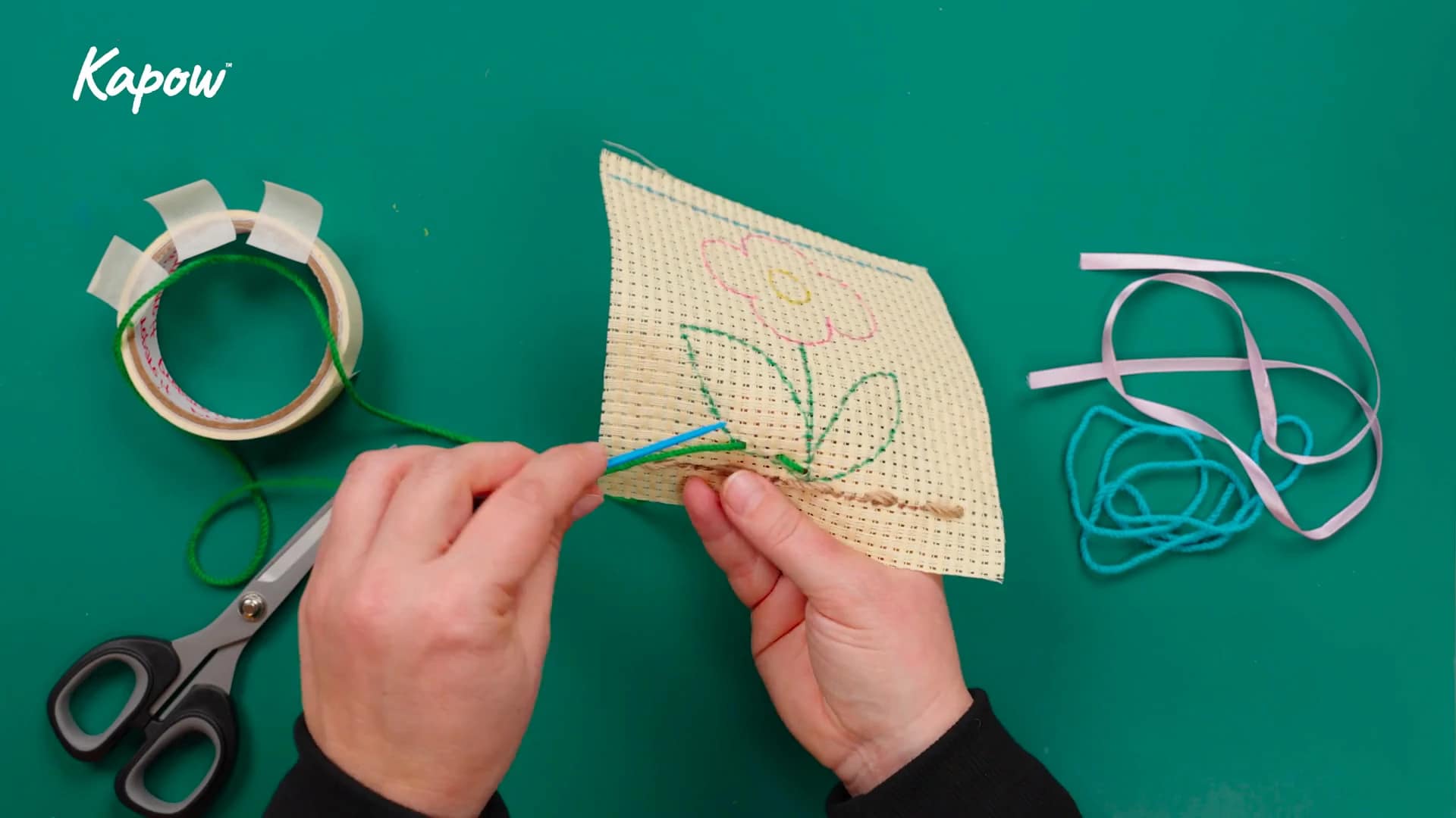 Pupil video: Stitching a design on bunting