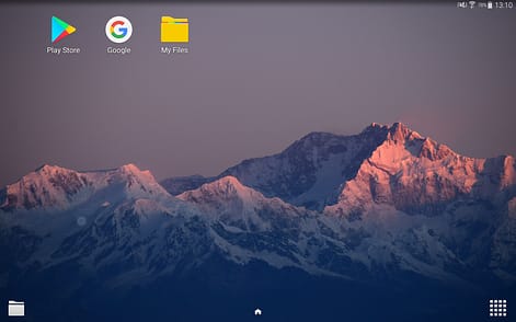 A screen showing the interface layout on an Android tablet device with a mountain and three app icons