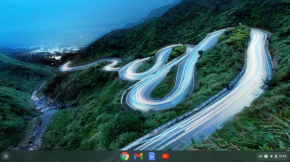 Chromebook desktop view of a hillside with a meandering road