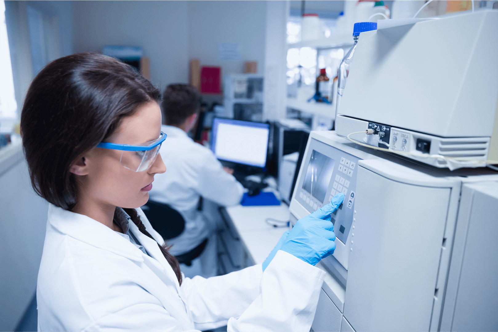 Lady in lab using machine