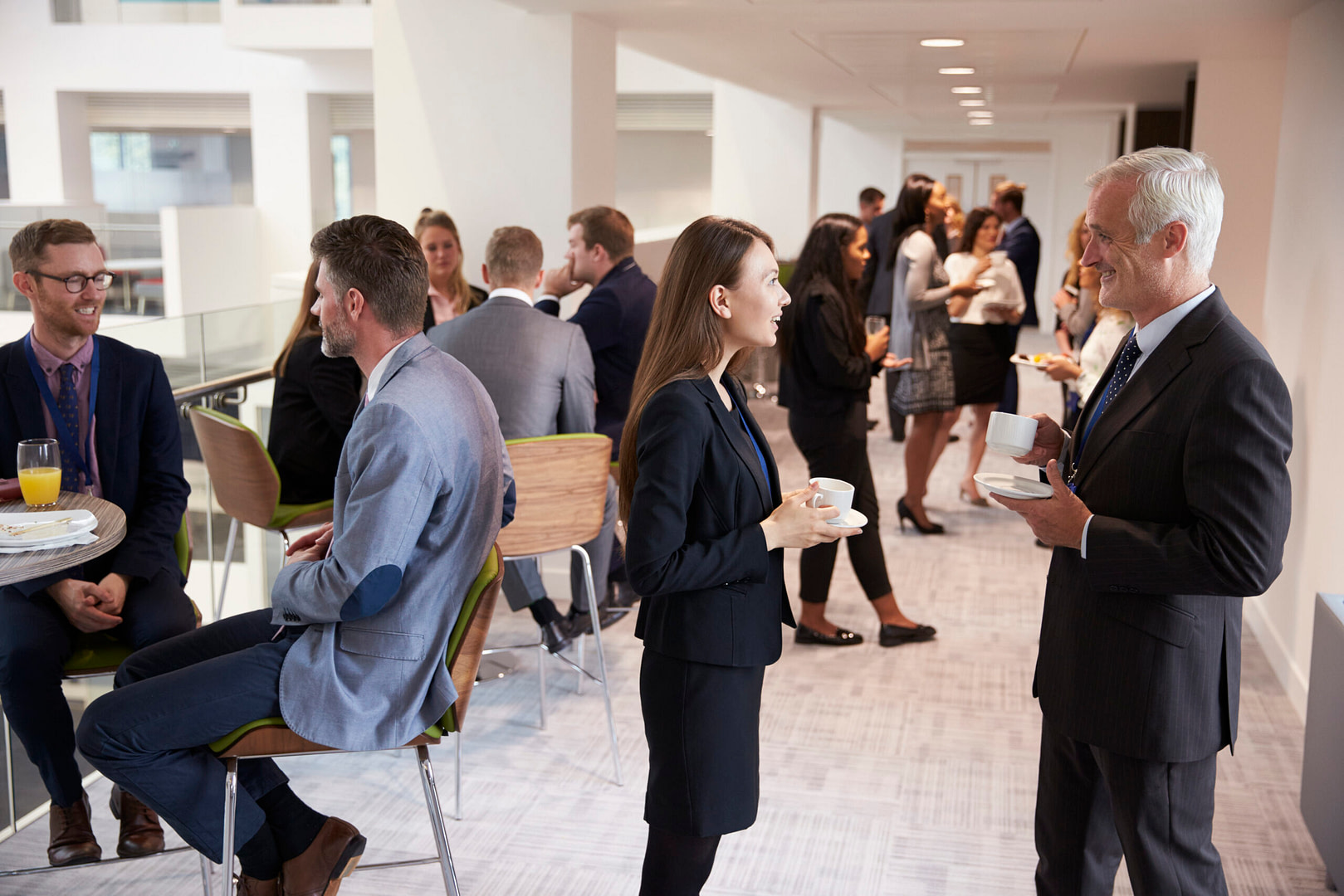 Delegates networking at a corporate event