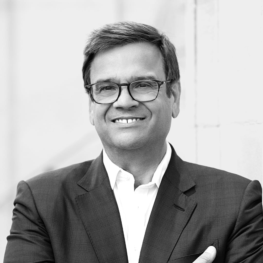 Black and white formal headshot of Jeremy Coller.
