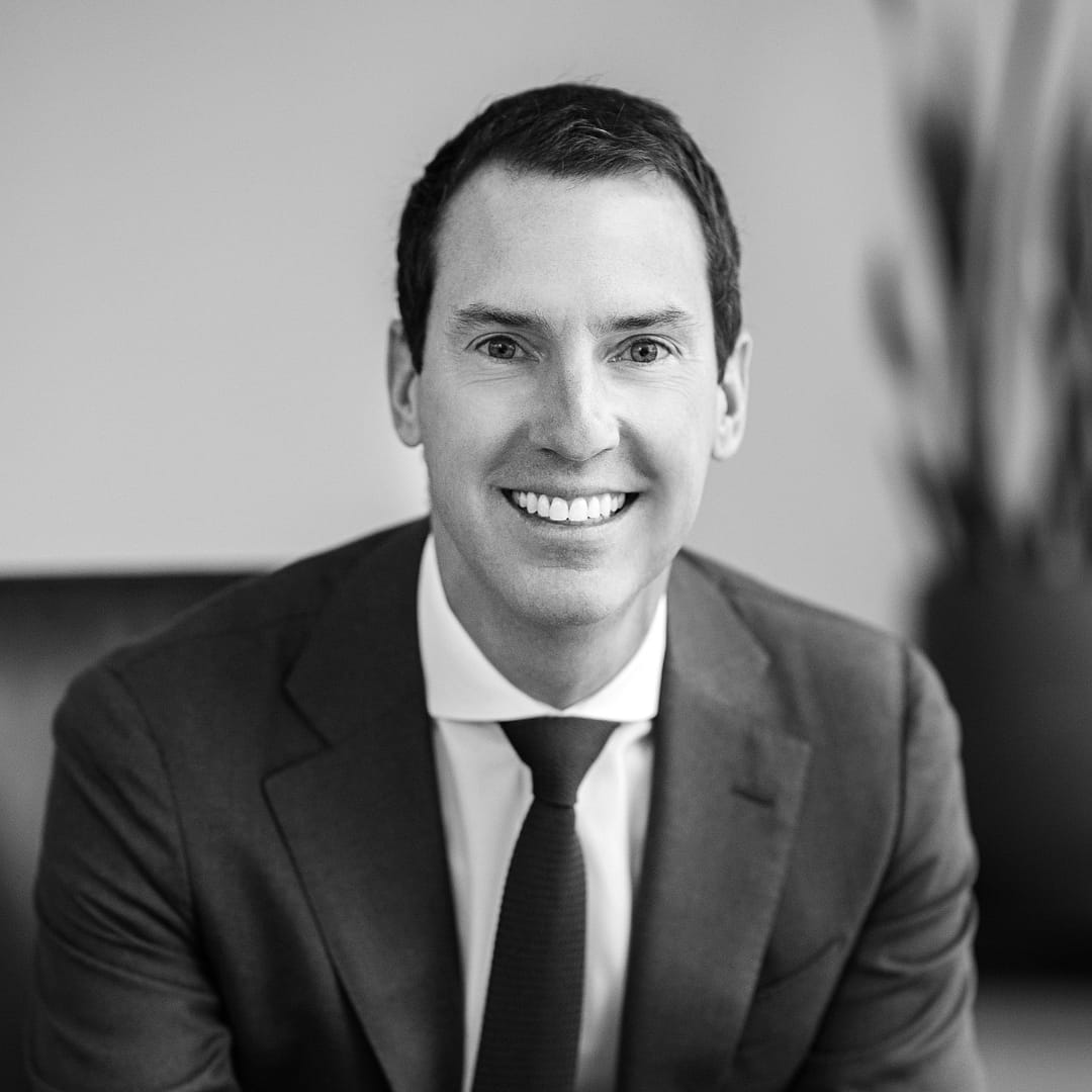 Black and white formal headshot of Jonathan McEvoy.
