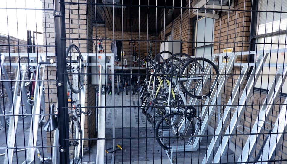 bicycle racks in mesh caging